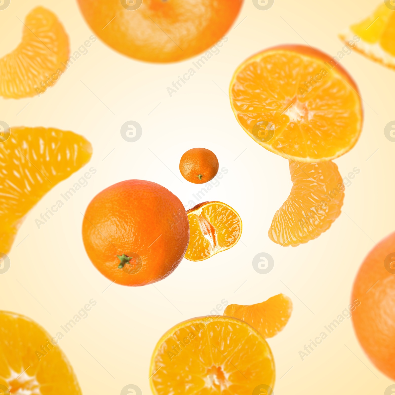 Image of Sweet tangerines whirling in air against beige gradient background
