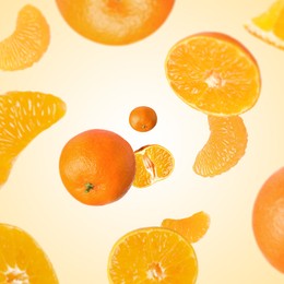 Image of Sweet tangerines whirling in air against beige gradient background