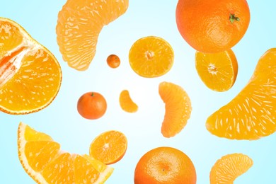 Image of Sweet tangerines whirling in air against light blue gradient background
