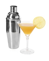 Photo of Tasty lemon cocktail in glass and metal shaker isolated on white