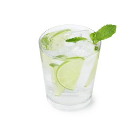 Photo of Tasty cocktail with lime slices and mint in glass isolated on white