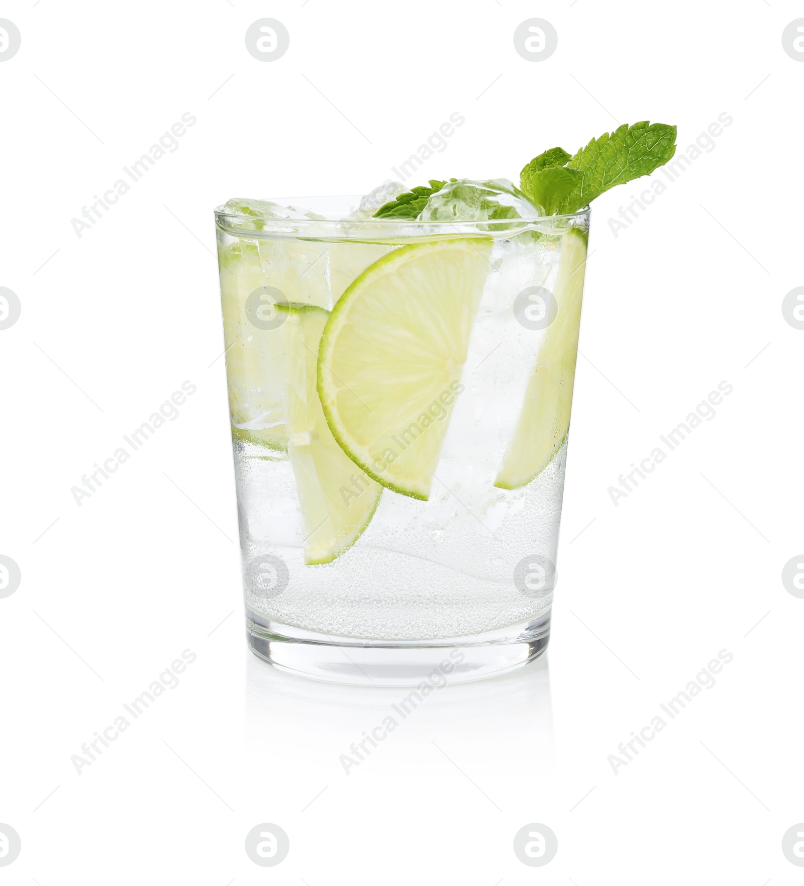 Tasty cocktail with lime slices and mint in glass isolated on white Photo of Tasty cocktail with lime slices and mint in glass isolated on white