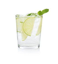 Photo of Tasty cocktail with lime slices and mint in glass isolated on white