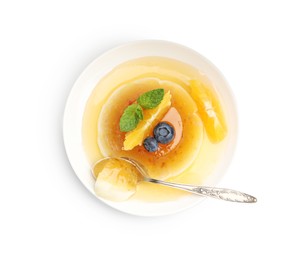 Photo of Tasty panna cotta with orange, blueberries and mint isolated on white, top view