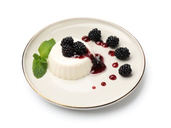 Photo of Tasty panna cotta with blackberries, mint and sauce isolated on white