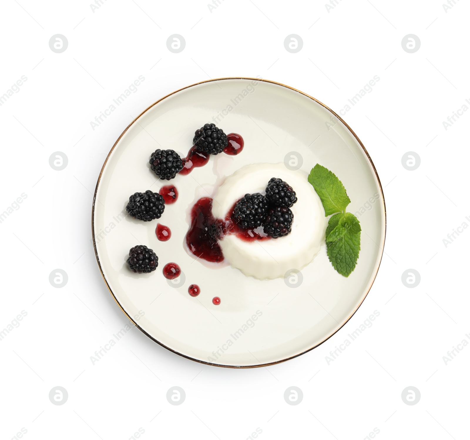 Tasty panna cotta with blackberries, mint and sauce isolated on white, top view Photo of Tasty panna cotta with blackberries, mint and sauce isolated on white, top view