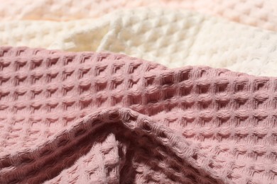 Photo of Clean waffle towels as background, closeup. Household item