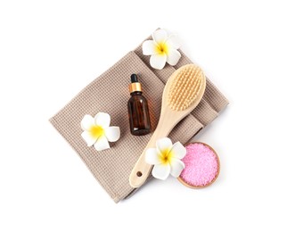 Photo of Clean waffle towels, plumeria flowers and spa products isolated on white, top view