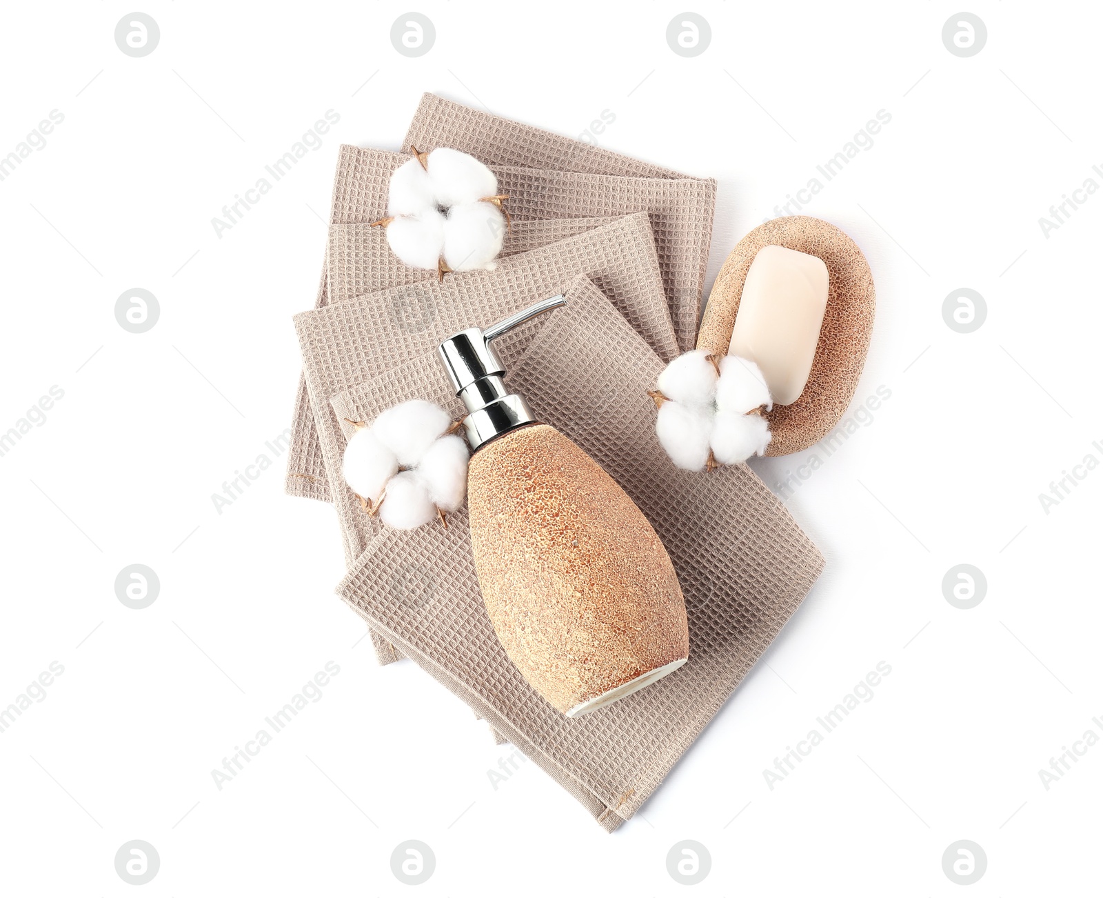 Photo of Clean waffle towels, cotton flowers and spa products isolated on white, top view