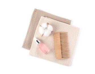 Photo of Clean waffle towels, cotton flower and spa products isolated on white, top view