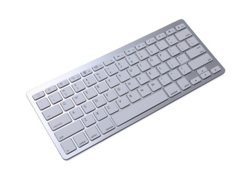 Photo of Modern wireless computer keyboard isolated on white, above view