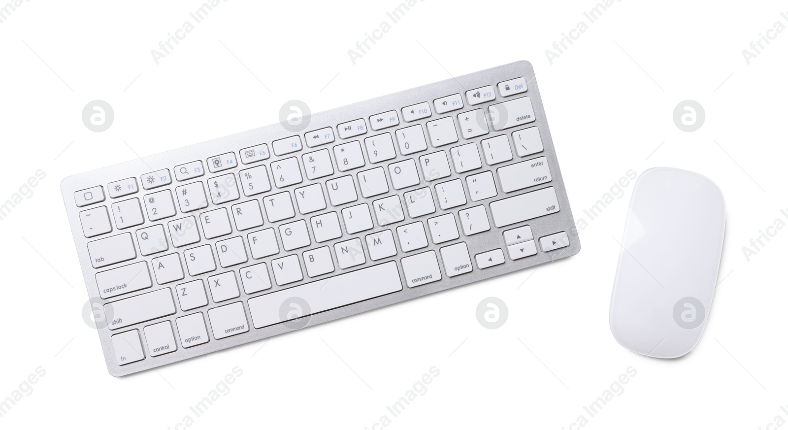Modern wireless computer keyboard and mouse isolated on white, top view Photo of Modern wireless computer keyboard and mouse isolated on white, top view