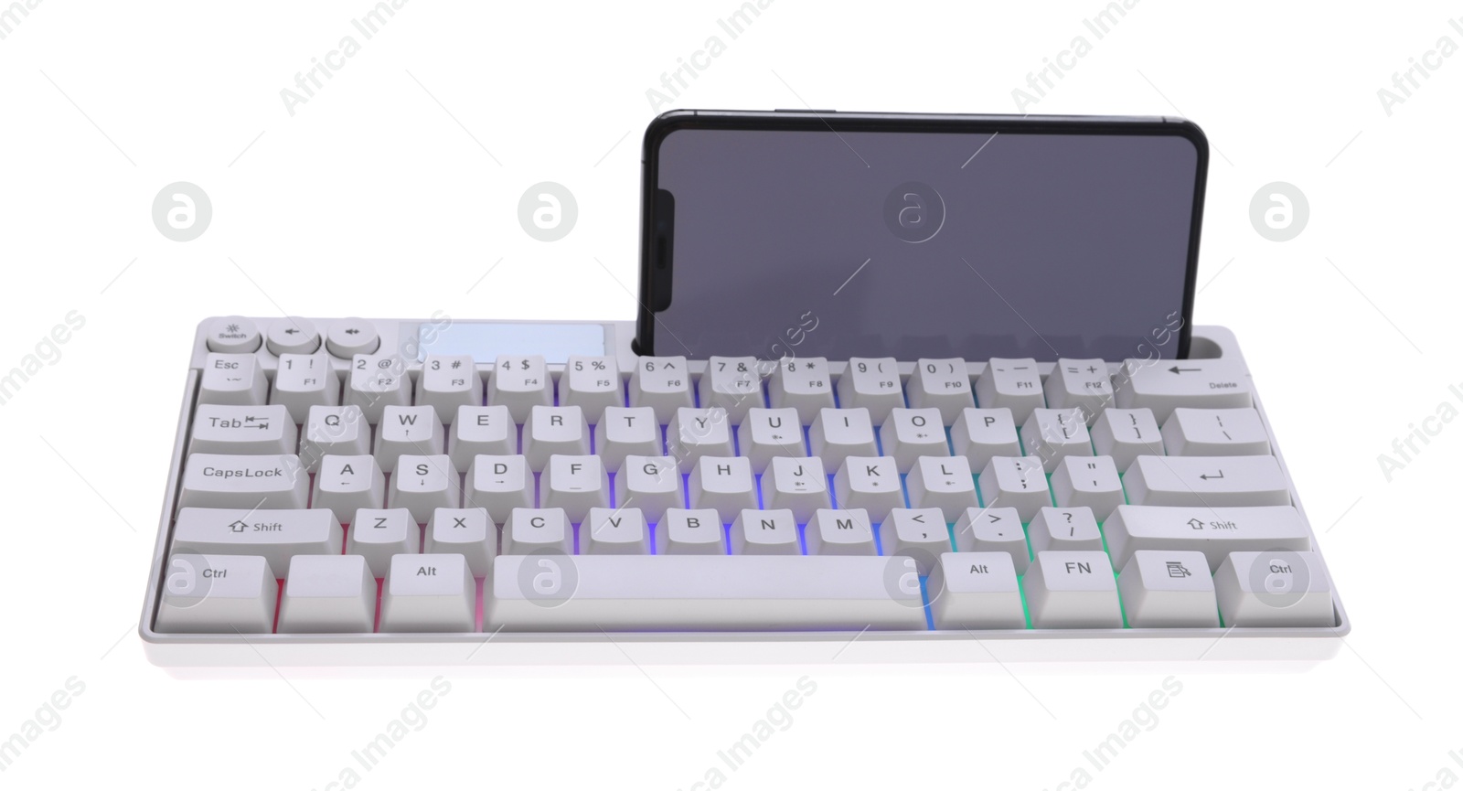 Modern computer keyboard with RGB lighting and smartphone isolated on white Photo of Modern computer keyboard with RGB lighting and smartphone isolated on white