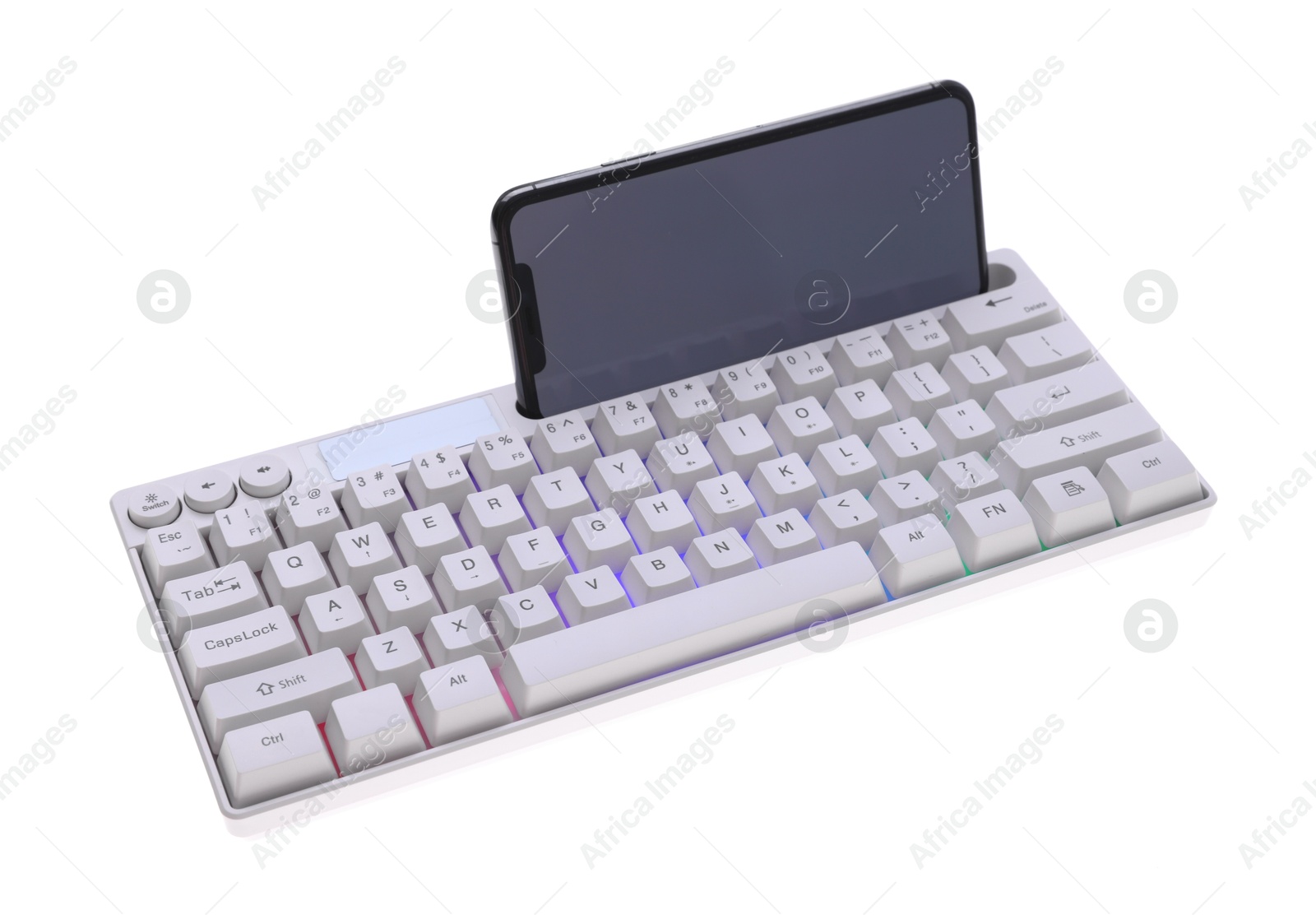 Modern computer keyboard with RGB lighting and smartphone isolated on white Photo of Modern computer keyboard with RGB lighting and smartphone isolated on white