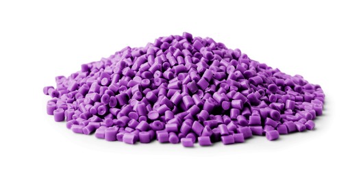 Image of Pile of purple plastic granules isolated on white