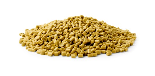Image of Pile of yellow plastic granules isolated on white