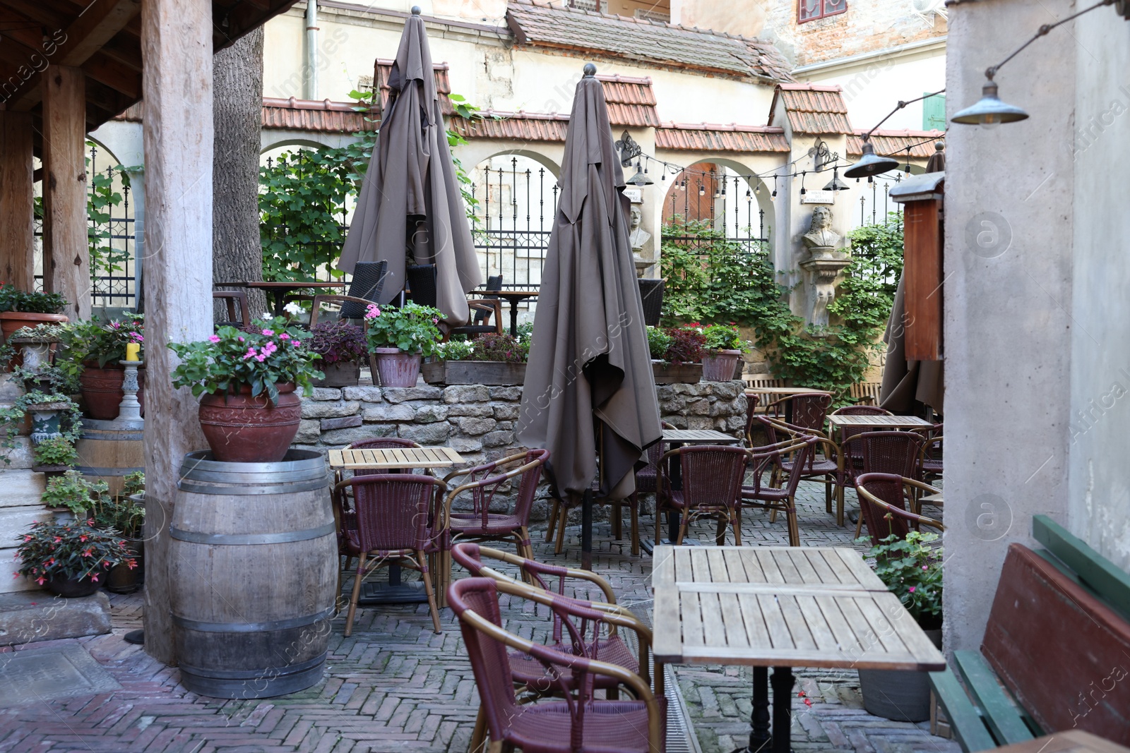 Photo of Outdoor cafe with stylish furniture and decor