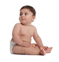 Photo of Cute little baby in diaper on white background
