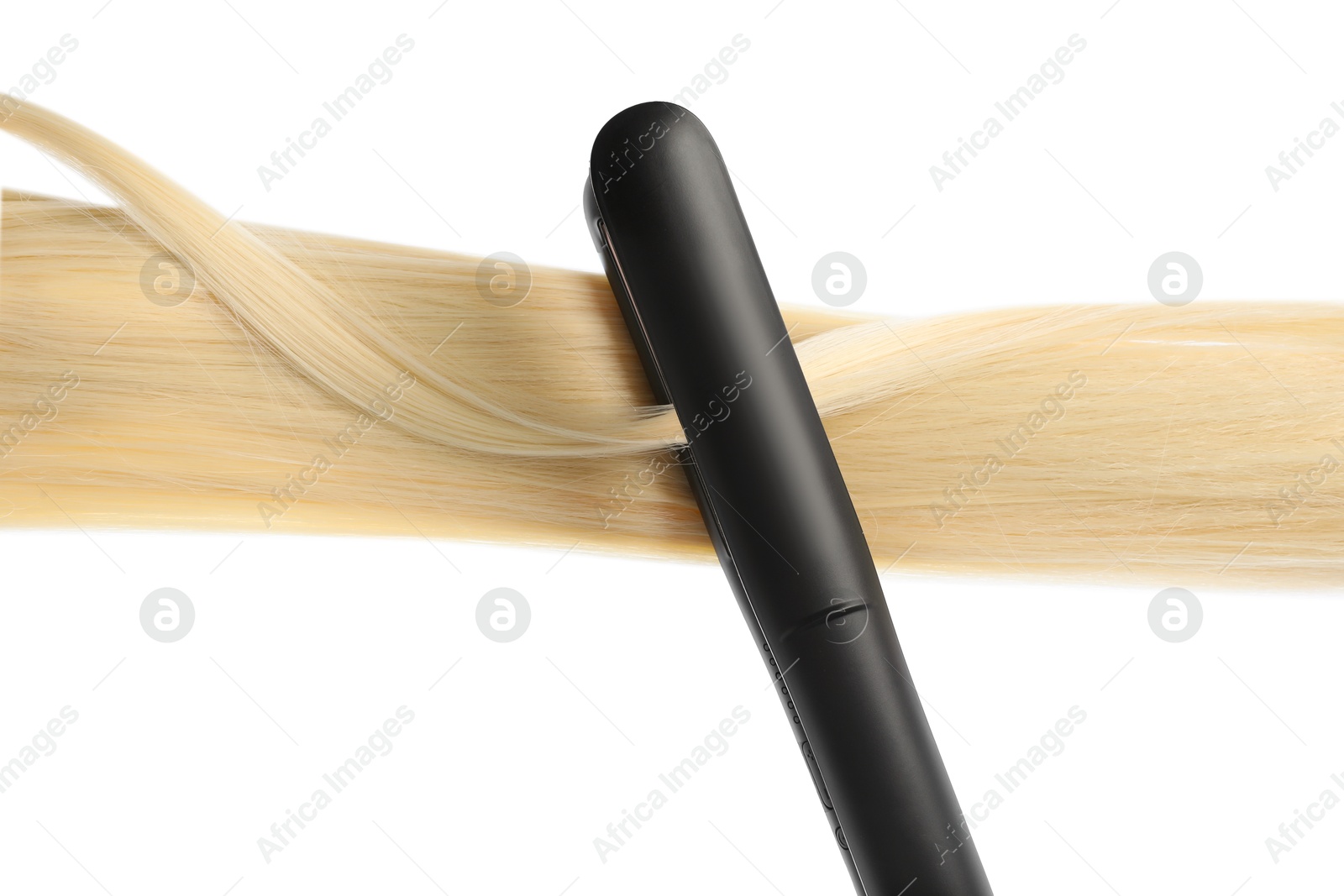 Straightener with blonde hair lock isolated on white Photo of Straightener with blonde hair lock isolated on white