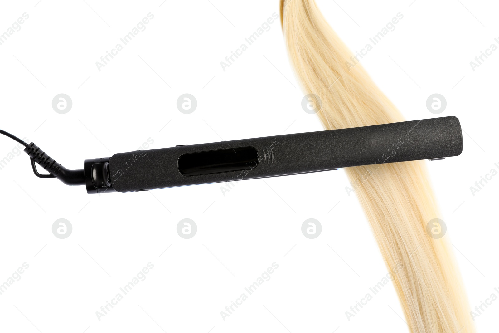 Straightener with blonde hair lock isolated on white Photo of Straightener with blonde hair lock isolated on white