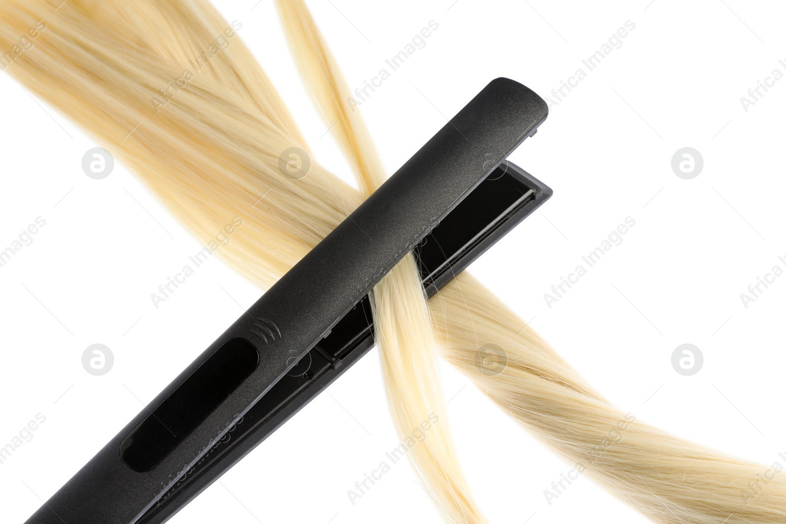 Straightener with blonde hair lock isolated on white Photo of Straightener with blonde hair lock isolated on white