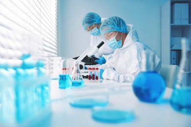 Photo of Medical analysis. Two scientists working in laboratory