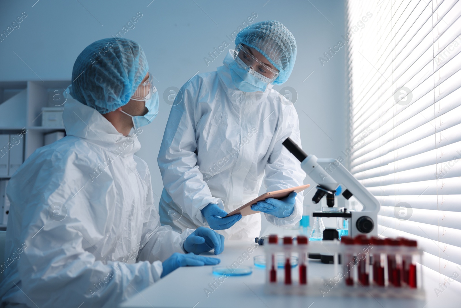 Medical analysis. Two Scientists working in laboratory Photo of Medical analysis. Two Scientists working in laboratory