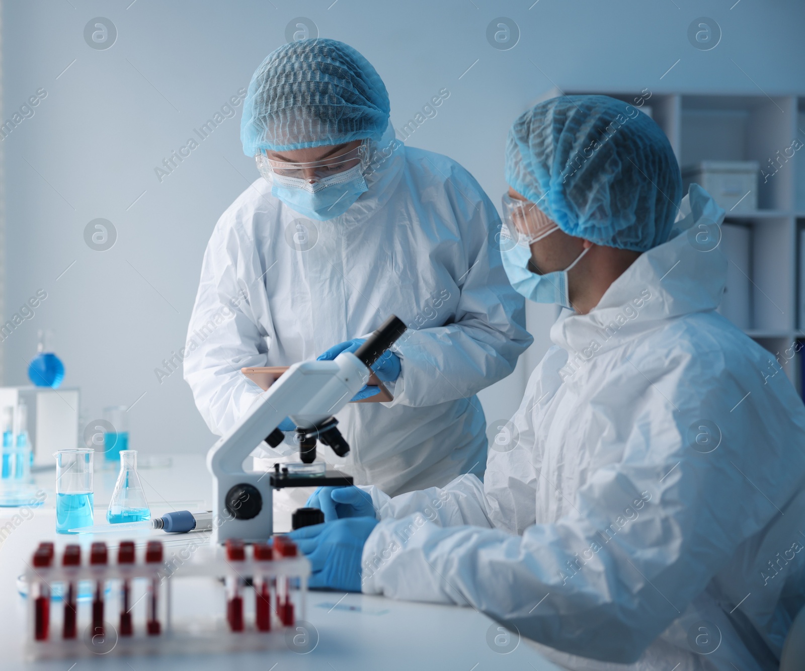 Medical analysis. Two Scientists working in laboratory Photo of Medical analysis. Two Scientists working in laboratory