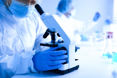 Photo of Medical analysis. Scientists working with samples in laboratory, selective focus