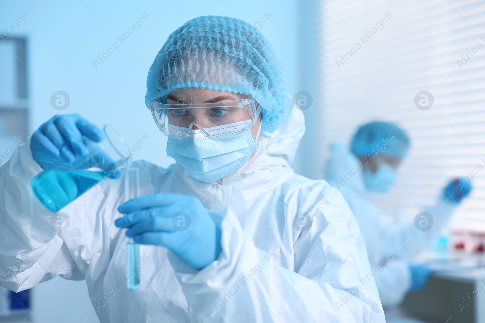 Medical analysis. Scientist working with sample in laboratory, selective focus Photo of Medical analysis. Scientist working with sample in laboratory, selective focus