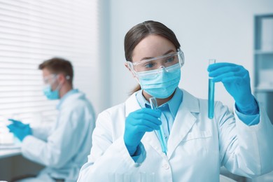 Photo of Medical analysis. Scientist working with samples in laboratory, selective focus