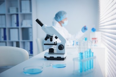 Photo of Medical analysis. Scientist working with samples in laboratory, selective focus