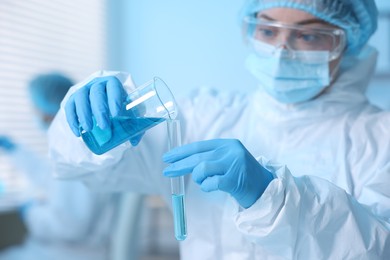 Photo of Medical analysis. Scientist working with sample in laboratory, selective focus