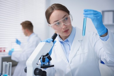 Photo of Medical analysis. Scientist working with sample in laboratory, selective focus