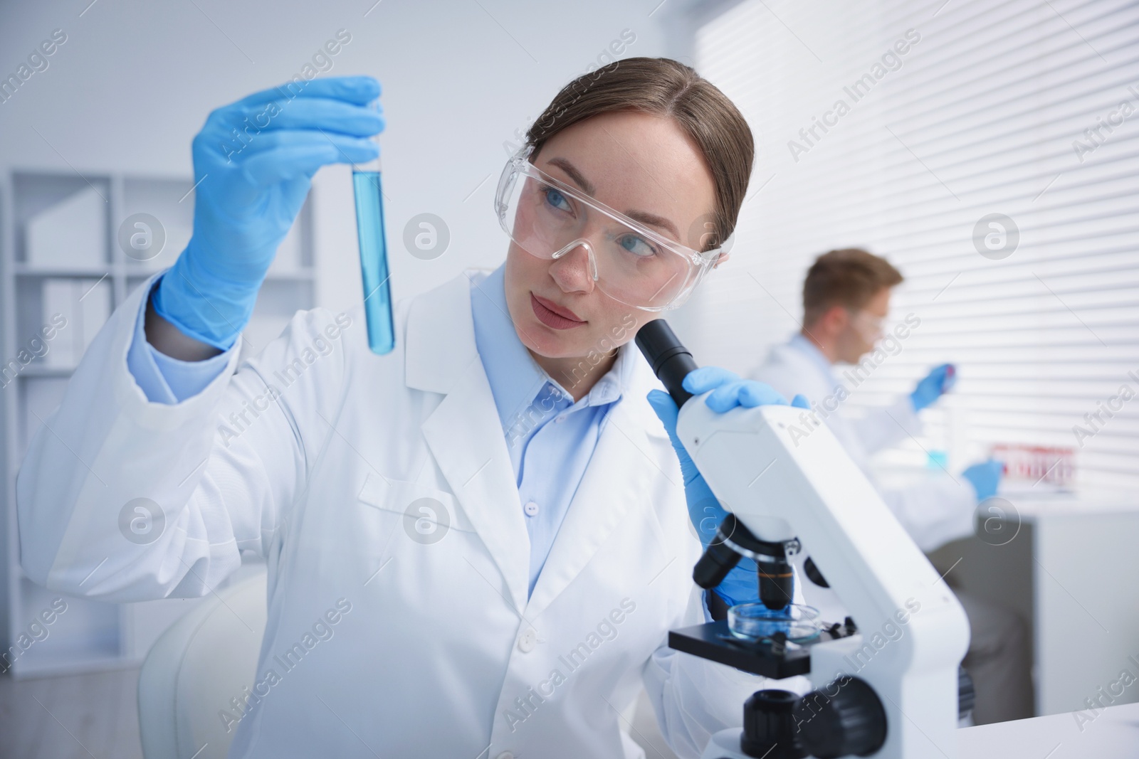 Medical analysis. Scientist working with sample in laboratory, selective focus Photo of Medical analysis. Scientist working with sample in laboratory, selective focus