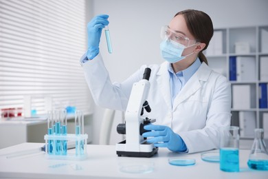 Photo of Medical analysis. Scientist working with sample in laboratory