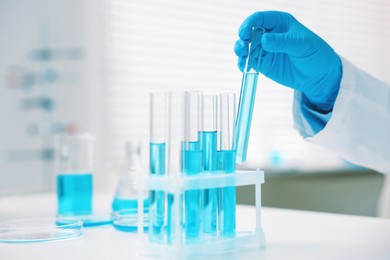 Photo of Medical analysis. Scientist working with samples in laboratory, closeup