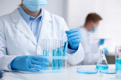Photo of Medical analysis. Scientist working with samples in laboratory, selective focus