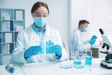 Photo of Medical analysis. Scientist working with samples in laboratory, selective focus