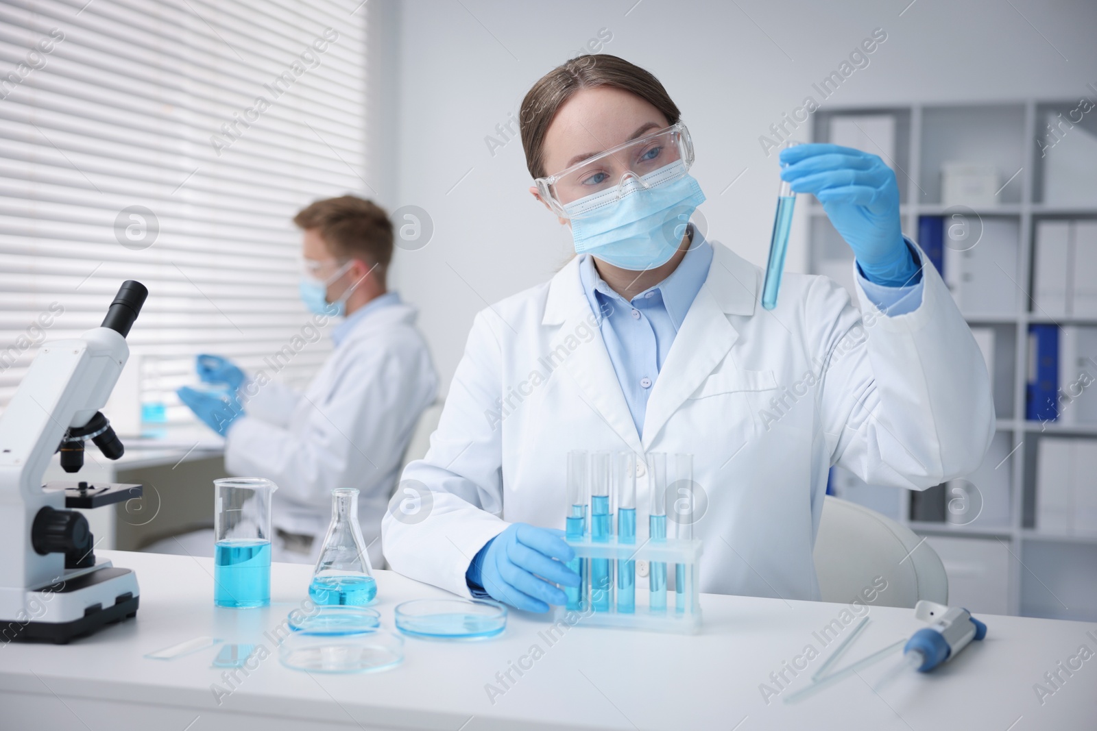 Medical analysis. Scientist working with samples in laboratory, selective focus Photo of Medical analysis. Scientist working with samples in laboratory, selective focus