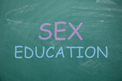 Image of Sex Education inscription on green chalkboard. School program