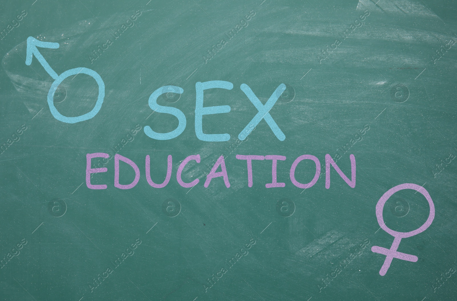 Sex Education inscription, female and male gender signs on green chalkboard Image of Sex Education inscription, female and male gender signs on green chalkboard