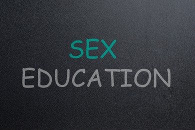 Image of Sex Education inscription on black chalkboard. School program