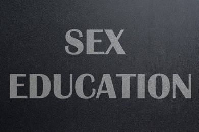 Image of Sex Education inscription on black chalkboard. School program