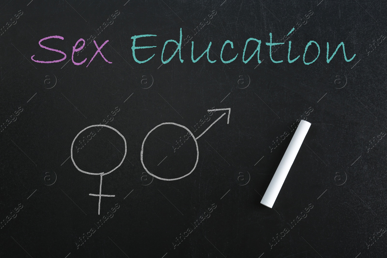 Sex Education inscription, female and male gender signs on black chalkboard Image of Sex Education inscription, female and male gender signs on black chalkboard