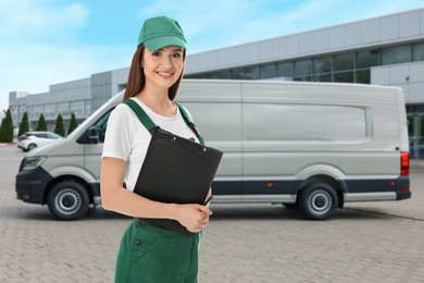 Image of Car service worker with clipboard and vehicle outdoors