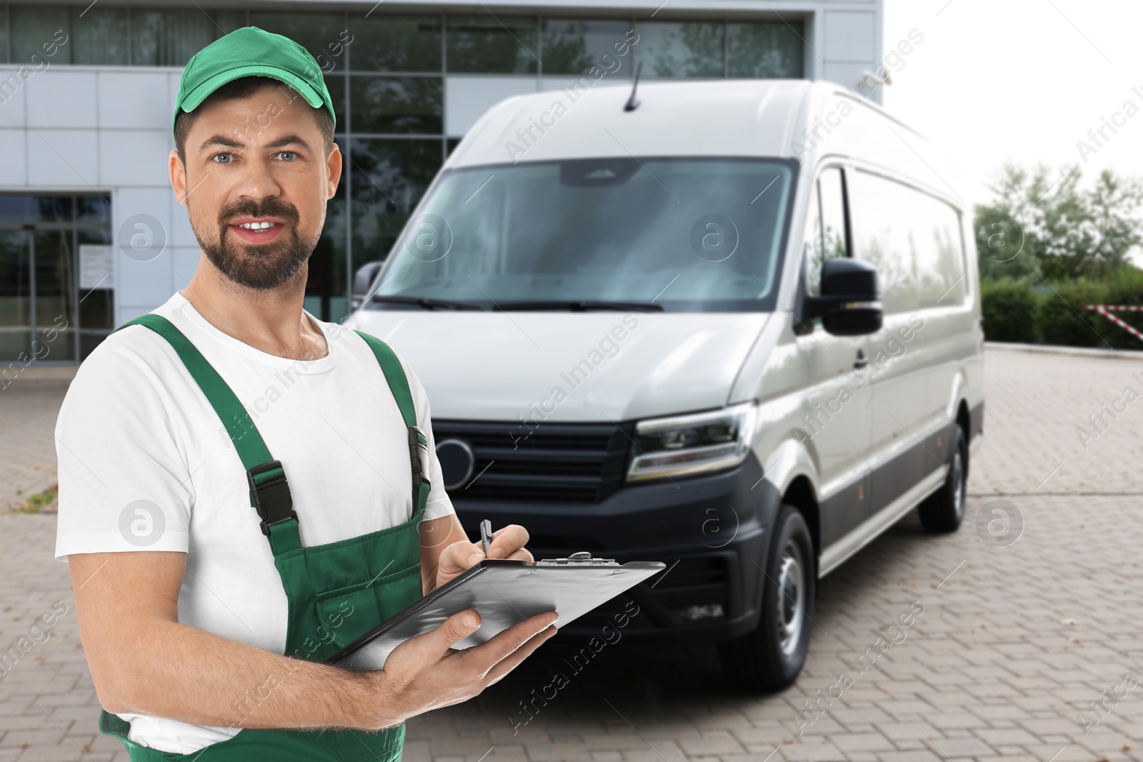 Car service worker with clipboard and vehicle outdoors Image of Car service worker with clipboard and vehicle outdoors