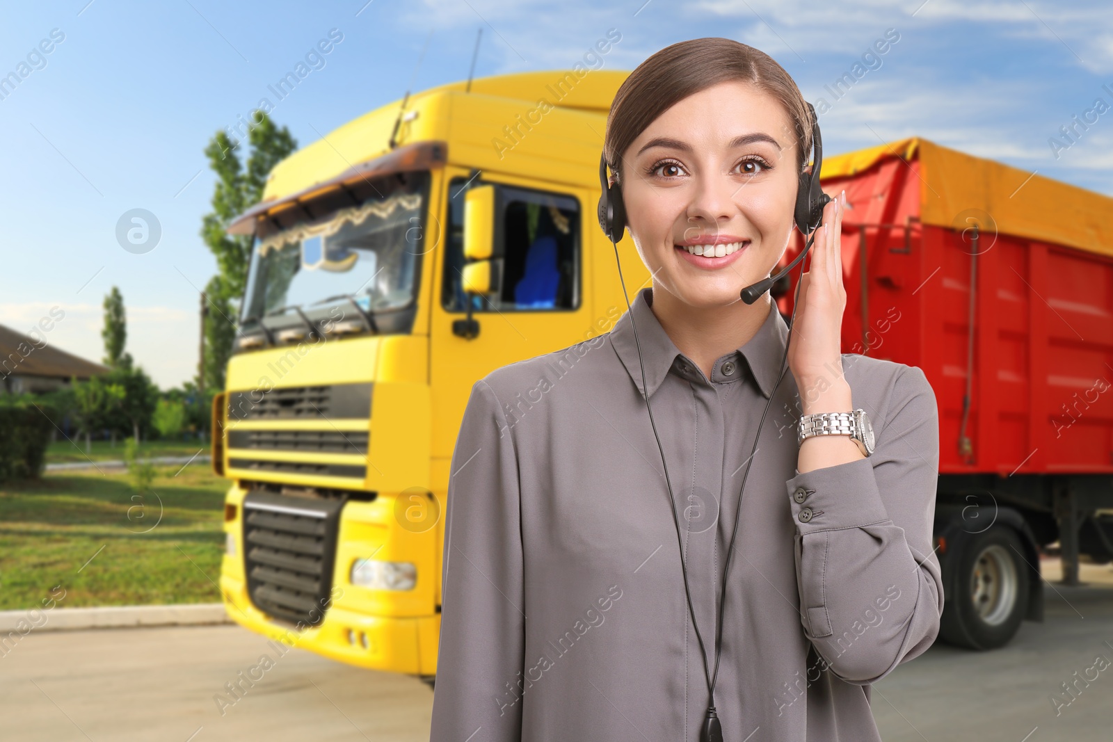 Car service worker with headset against truck outdoors. Client support Image of Car service worker with headset against truck outdoors. Client support