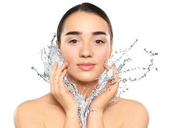 Image of Woman with smooth skin and water splash against white background