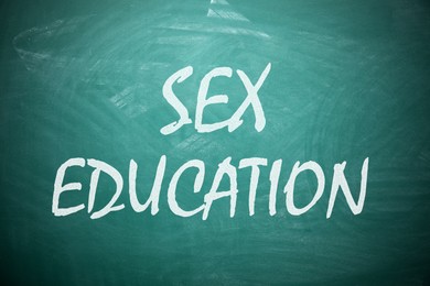 Image of Sex Education inscription on green chalkboard. School program
